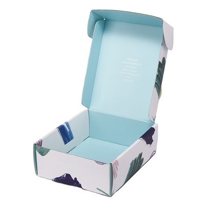 La extensión del pelo acanaló la caja de empaquetado de papel viste la barra de labios del zapato