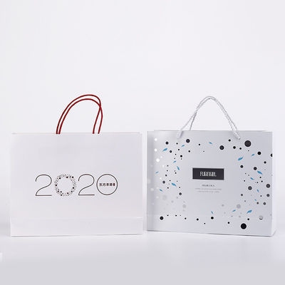 Logotipo laminado de empaquetado de C1S que hace compras Art Paper Tote Bags Custom