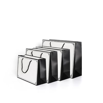Logotipo laminado de empaquetado de C1S que hace compras Art Paper Tote Bags Custom